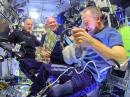 (L-R) Ricky Arnold, KE5DAU; Soyuz Commander Oleg Artemyev, and Drew Feustel will return to Earth on October 4 after 197 days in space. [NASA photo]